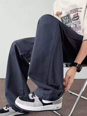 Navy blue casual wide-leg cargo pants with multiple pockets and a relaxed fit.