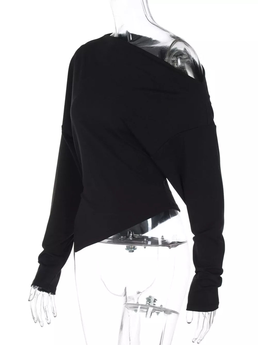 Black draped asymmetrical off-shoulder t-shirt with long sleeves.