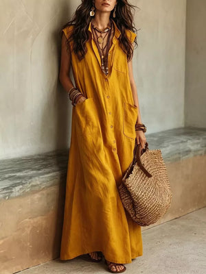 maxi dress in mustard yellow featuring buttoned and A-line fit