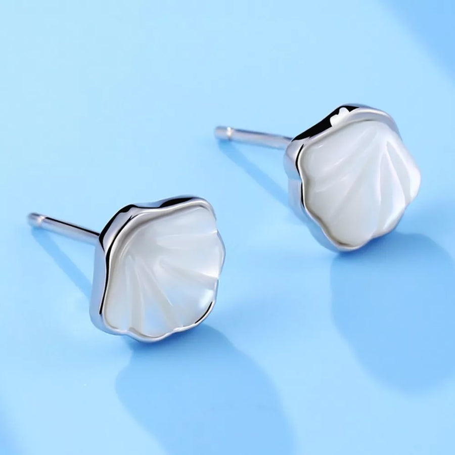 925 sterling silver,Fritillaria Care instructions: Avoid wearing during exercise earrings in iridescent white with fitted