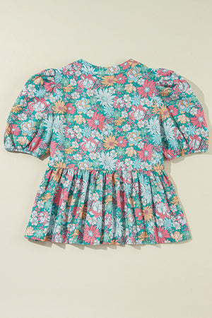 Floral peplum blouse with puff sleeves and scallop trim
