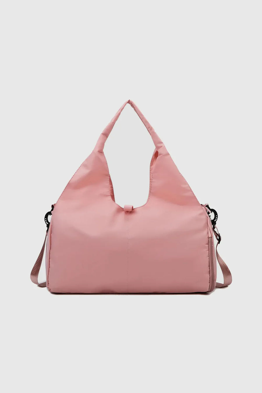Dusty Pink duffel bag with dual handles and a crossbody strap, perfect for gym or travel.