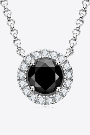 Black Halo Moissanite necklace with a round black center stone surrounded by clear accent stones on a silver chain.