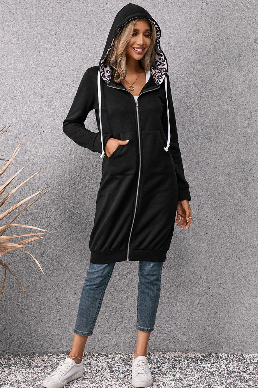 Black maxi hoodie dress with leopard print lining and white drawstrings.