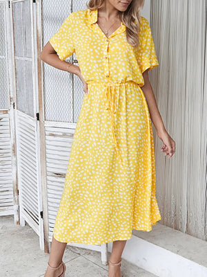 Yellow polka dot midi dress with drawstring waist and button front.