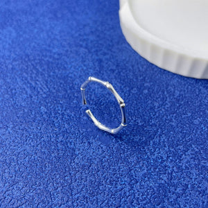 ring in Silver with branch motif and open design