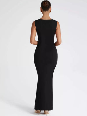 Black sleeveless bodycon maxi dress with square neckline.