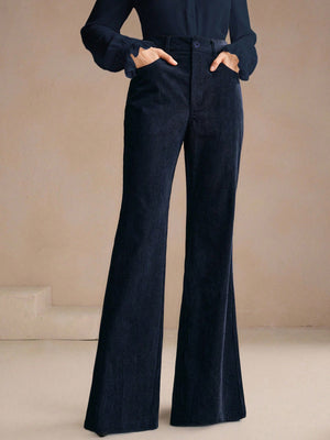 100% polyester Care instructions: Machine wash cold flare pants in navy blue with flared silhouette