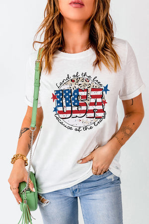 White graphic tee with USA flag design and leopard print detail.