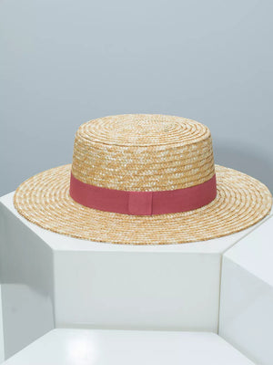 Women's straw boater hat with rose red ribbon band