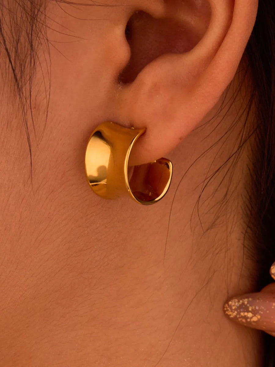 earrings in gold featuring 18K gold plating and hoop fit
