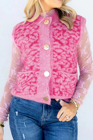 light pink sweater vest with hip-length and button-front