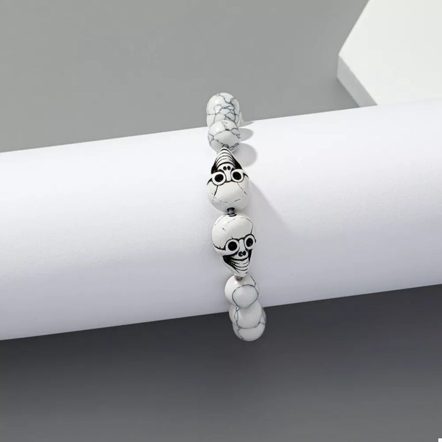 Resin, Stone Care instructions: 1 bracelet in White with beaded silhouette