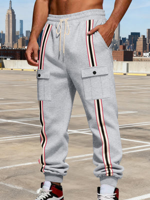 95%polyester,5%spandex Care instructions: Machine wash cold joggers in Black with relaxed silhouette