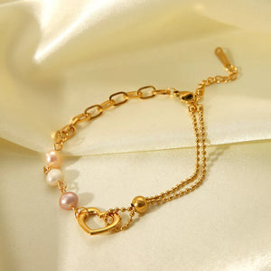 bracelet in cream with heart charm and wrist-length