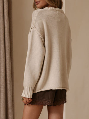 100% polyester Care instructions: Machine wash cold pullover sweater in Apricot Color with relaxed silhouette