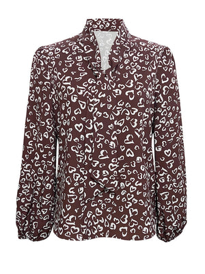 Burgundy blouse featuring bow-tie neck and geometric