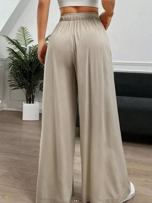 wide-leg pants in light beige with drawstring waist and full-length