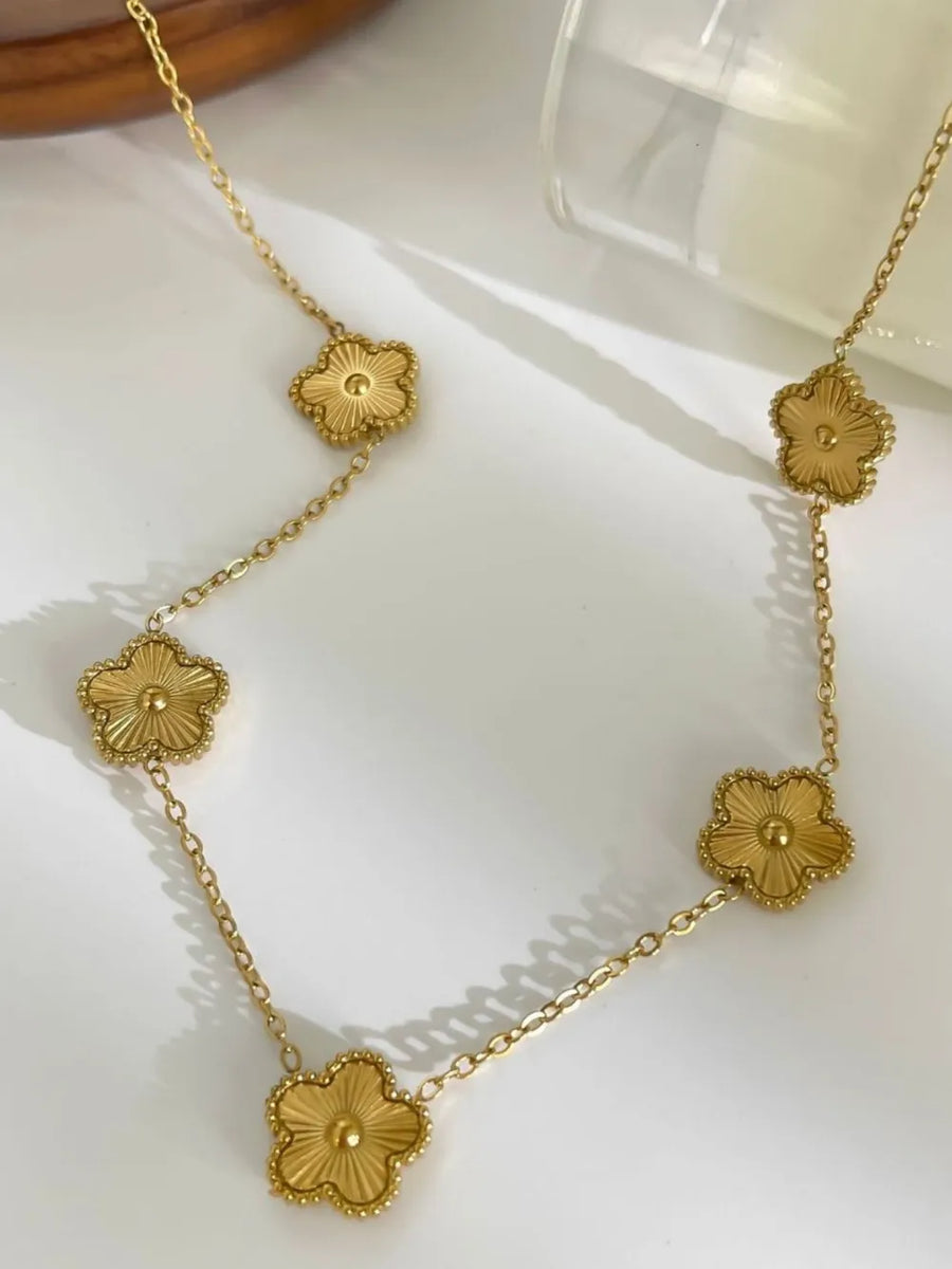 necklace featuring floral in gold with 18K texture