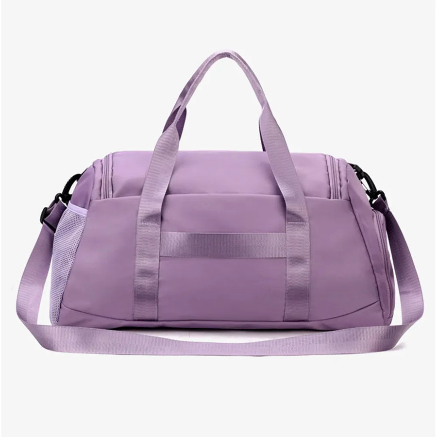 Mauve nylon duffle bag with mesh pocket and adjustable strap