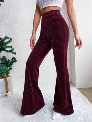Burgundy corduroy high-waist flare maternity pants with bell bottoms.