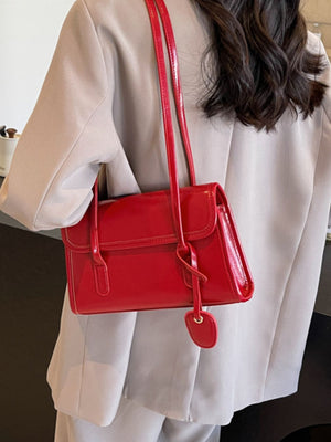black with shoulder bag with flap closure