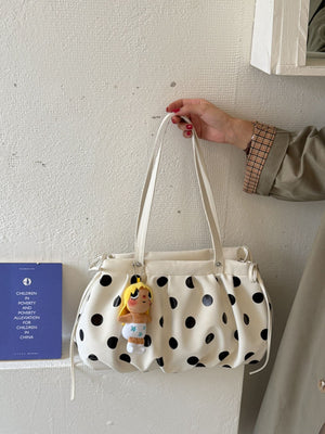 Drawstring Polka Dot Shoulder Bag in white with drawstring sides