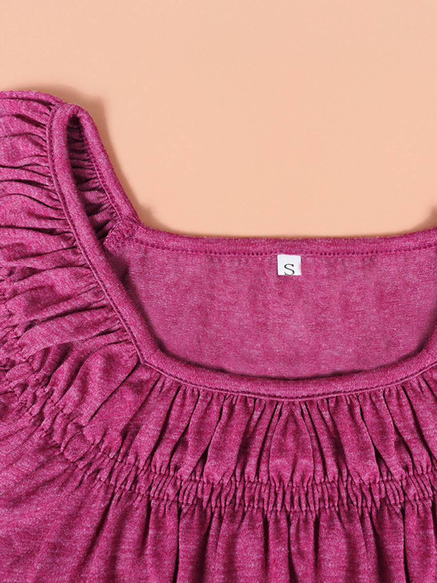 Off-shoulder ruffled sleeve top in hot pink with a square neckline.