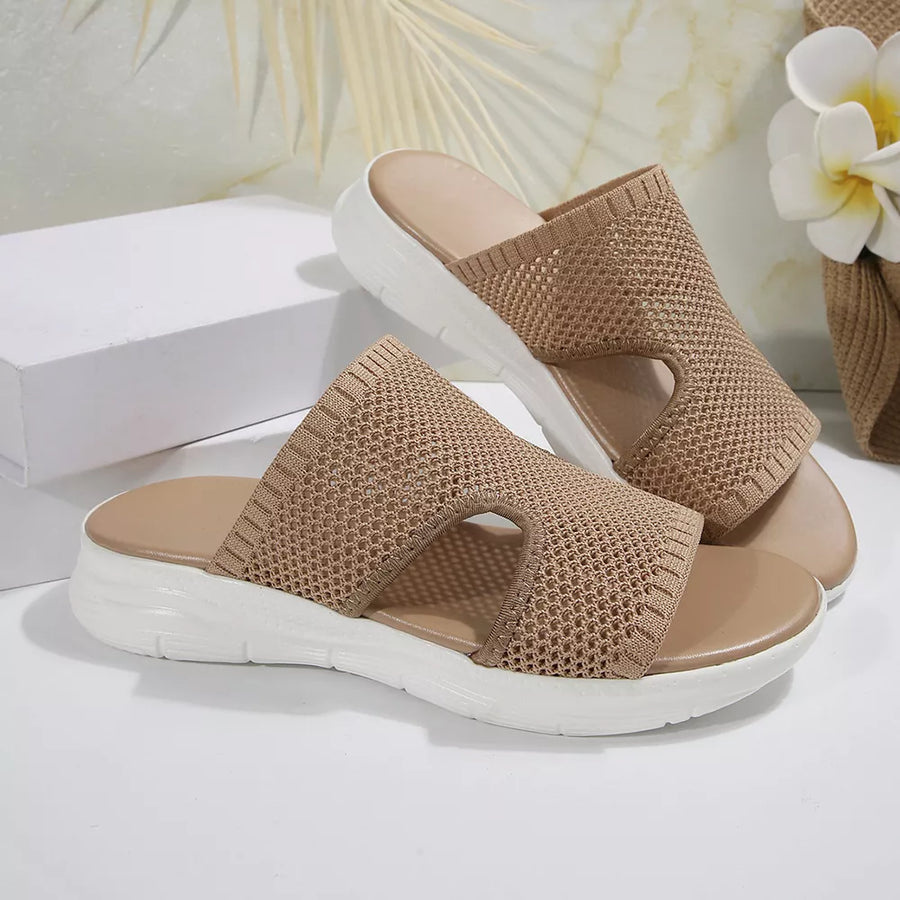 Khaki open-toe mesh sandals with a comfortable platform sole.
