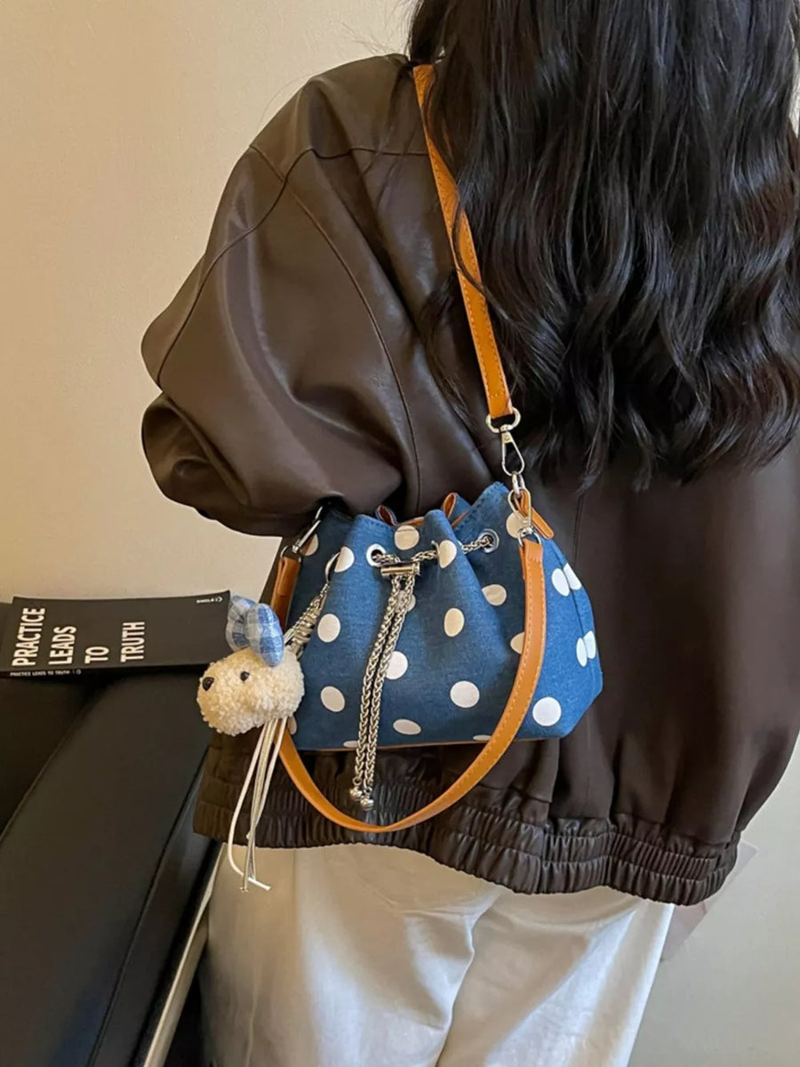 crossbody bag featuring polka dot in white with Polyester Imported Size & texture