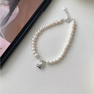 cream bracelet with pearl beads and not applicable