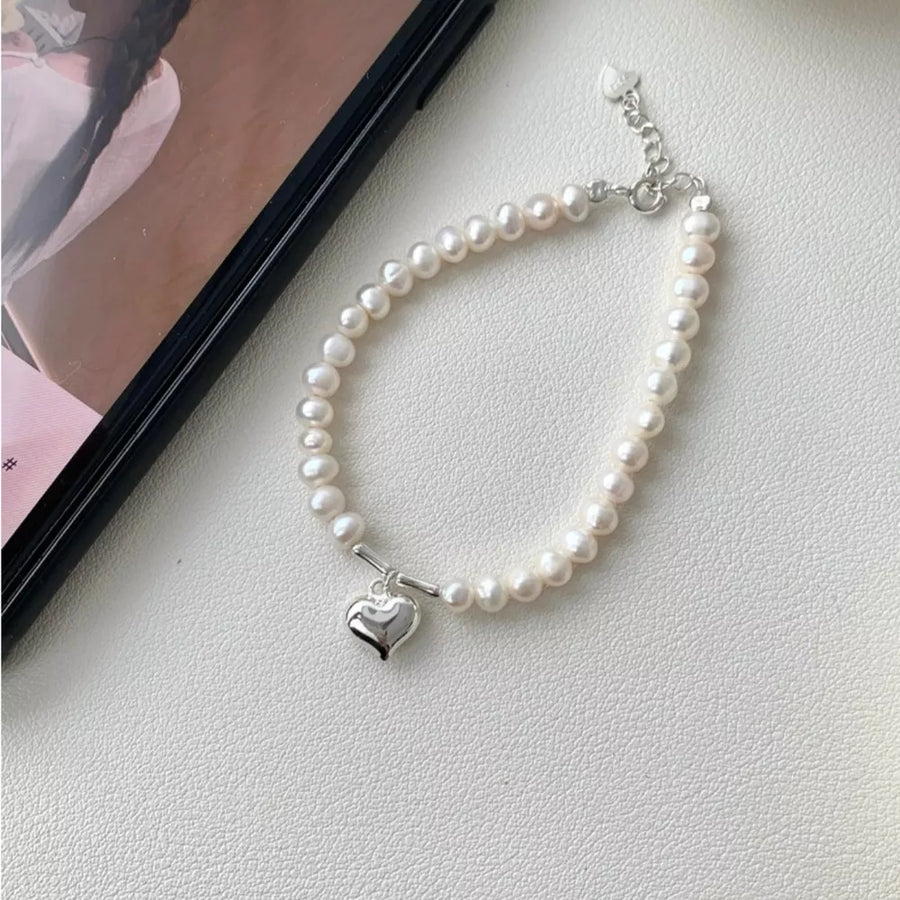 cream bracelet with pearl beads and not applicable