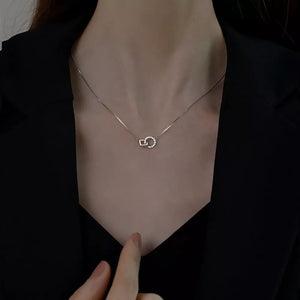 necklace in silver featuring zircon embellishment and slim fit