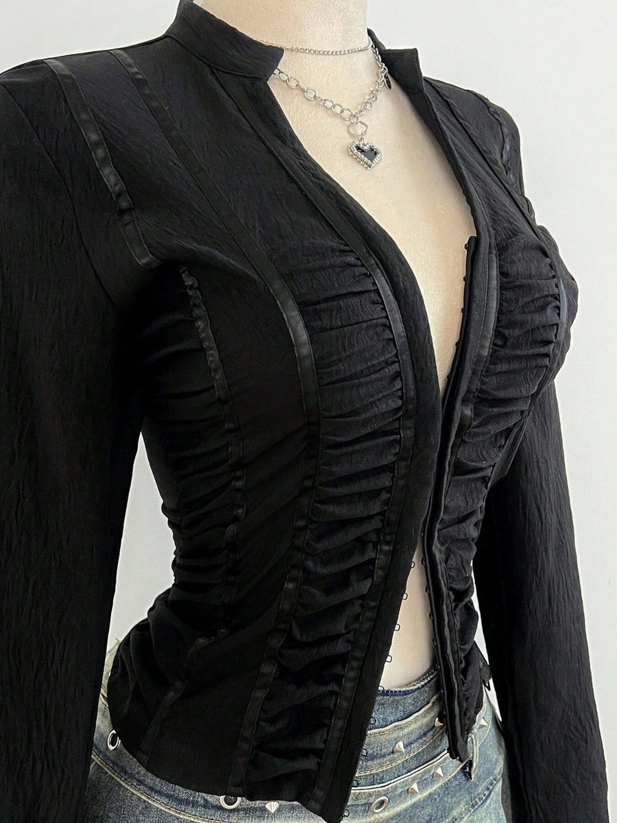 100% polyester Care instructions: Machine wash cold blouse in Black with slim silhouette