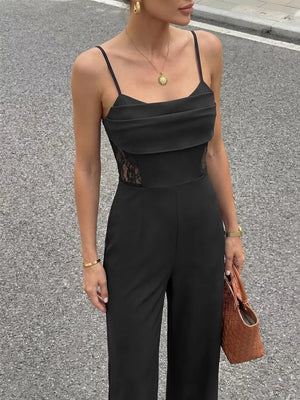 Black lace-trimmed wide-leg romper with spaghetti straps and a draped bodice.
