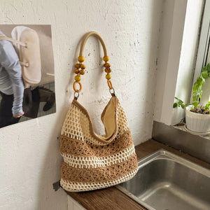 handbag in cream featuring crochet knit and relaxed fit