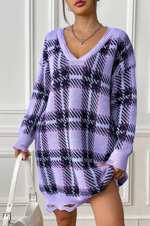 Distressed hem plaid knit mini dress in pastel yellow with V-neck and long sleeves.