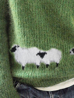 Green pullover sweater featuring stretch and animal graphic