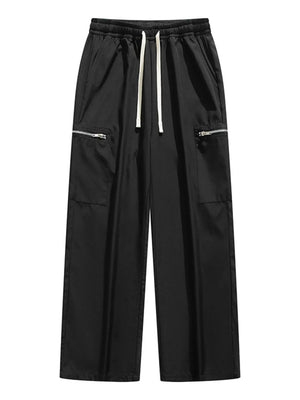 Black wide-leg cargo pants with drawstring and zippered pockets