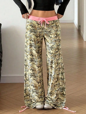 100% polyester Care instructions: Machine wash cold sweatpants in brown with wide-leg silhouette