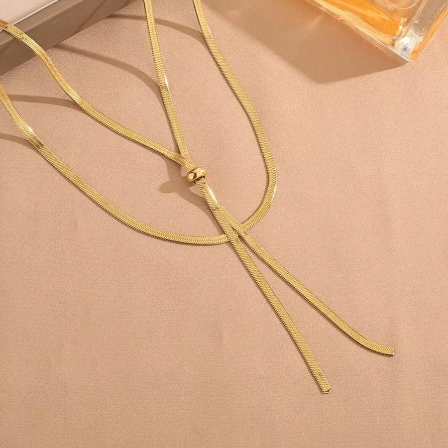 Gold layered snake chain necklace with adjustable knot detail