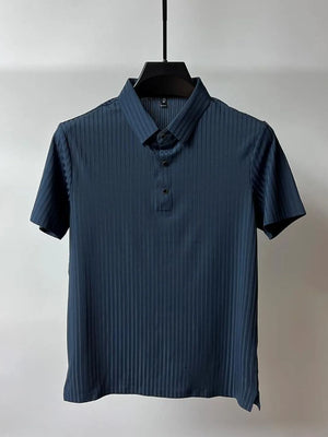 Peacock blue ribbed polo shirt with short sleeves and buttoned placket.