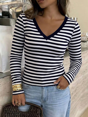 white t-shirt featuring stretch and striped