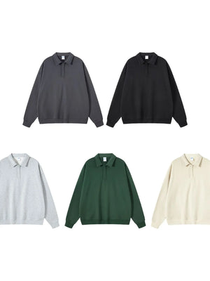 Oversized polo sweatshirt with collar in dark gray, black, dark green, gray, and tan.