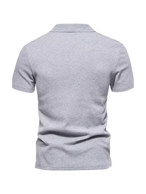 Men's light gray cotton blend casual polo shirt with notched collar and short sleeves.