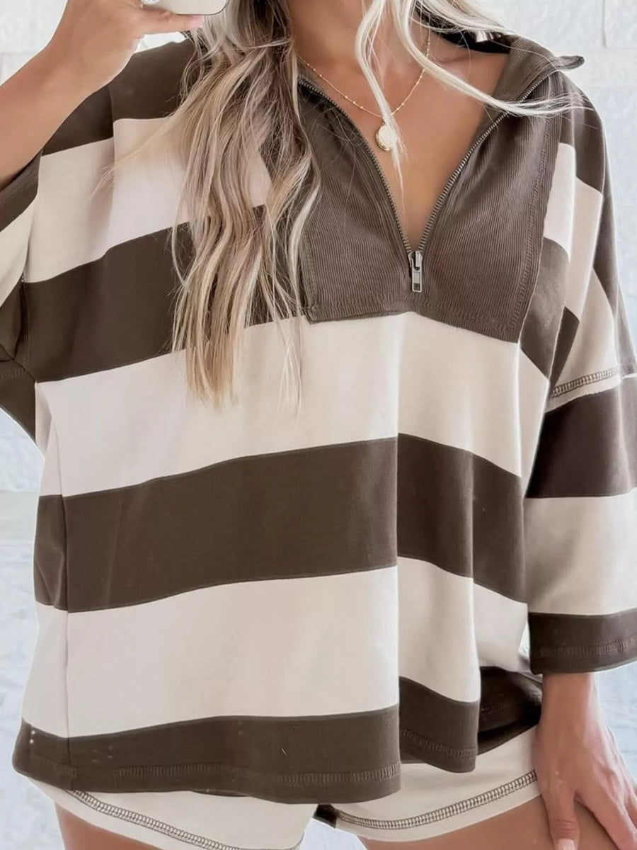 Quarter-zip sweatshirt with brown and cream stripes, corduroy collar detail, and relaxed fit.