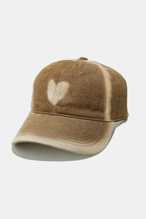 Caramel bleached heart baseball cap with distressed details