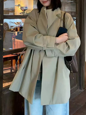 Tan trench coat with drawstring and long sleeve