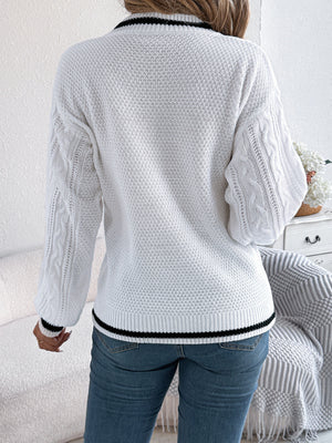 100% acrylic Care instructions: Machine wash cold v-neck sweater in White with relaxed silhouette