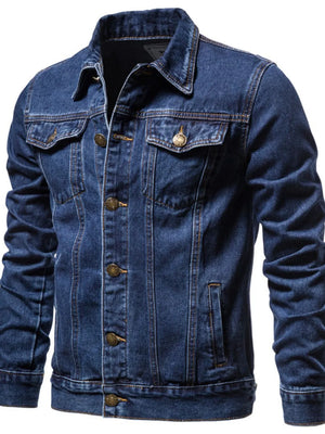 Medium wash denim trucker jacket with button closure and chest pockets.